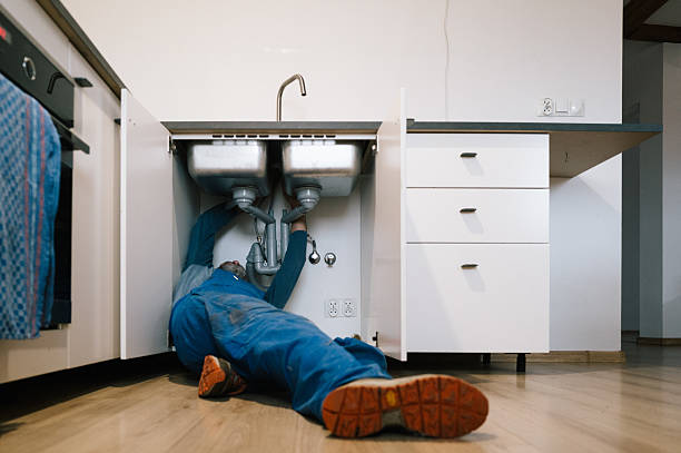 Professional Emergency Plumber technician working in Lima, PA
